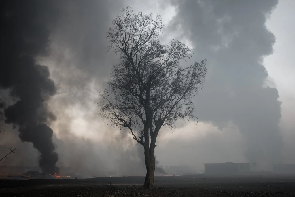 Burning oil pits in Qayyarah, Iraq on Oct. 26, 2016.